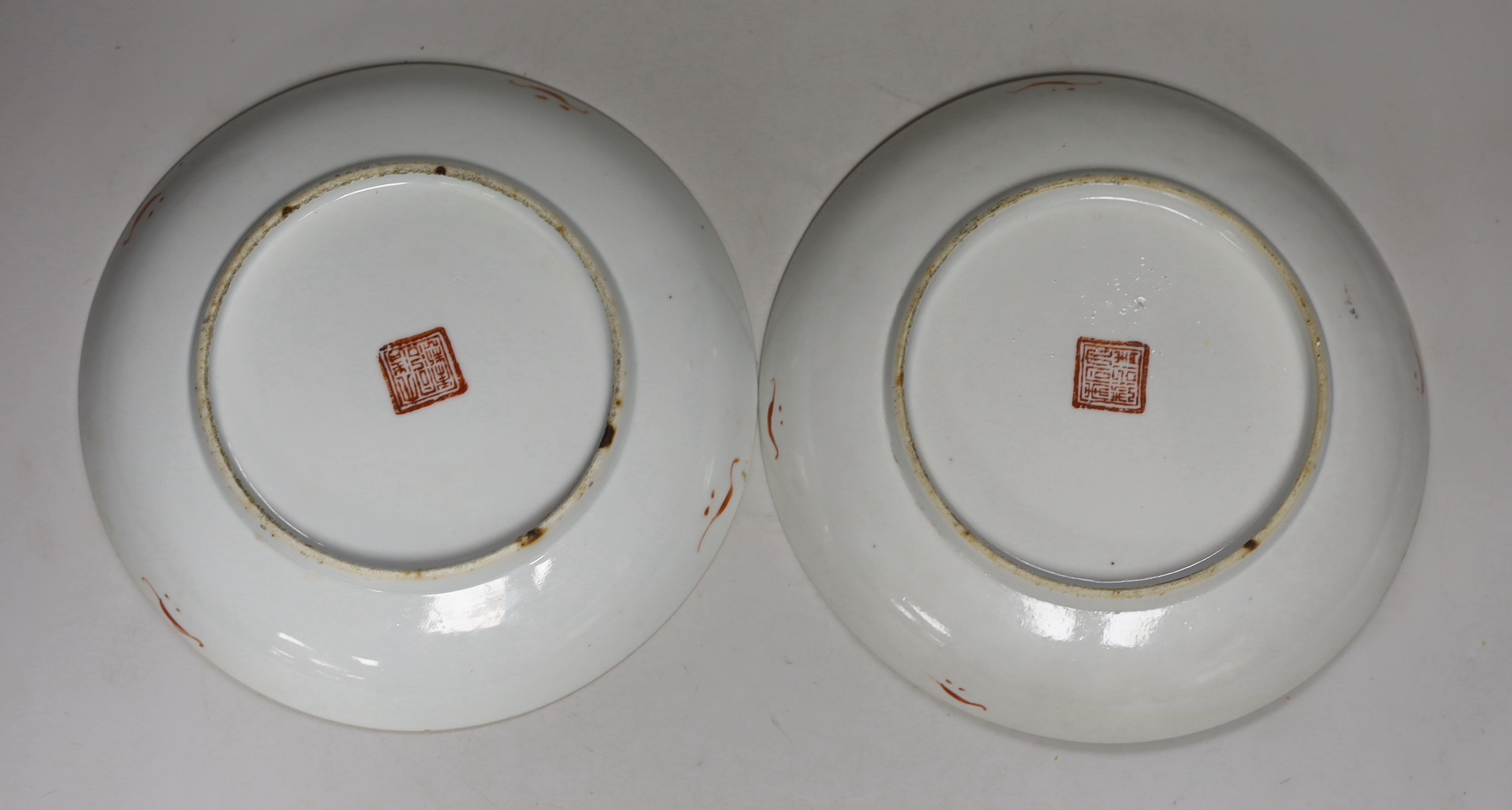 A pair of late 19th century Chinese iron red enamelled ‘sanduo’ dishes, Tongzhi marks, 23cm diameter